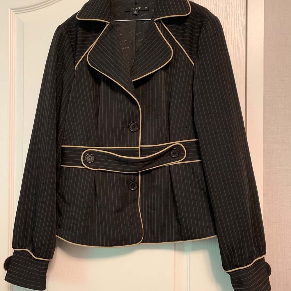 Tan and black suit never worn